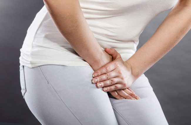 Why does itching and burning occur in the intimate area in women?